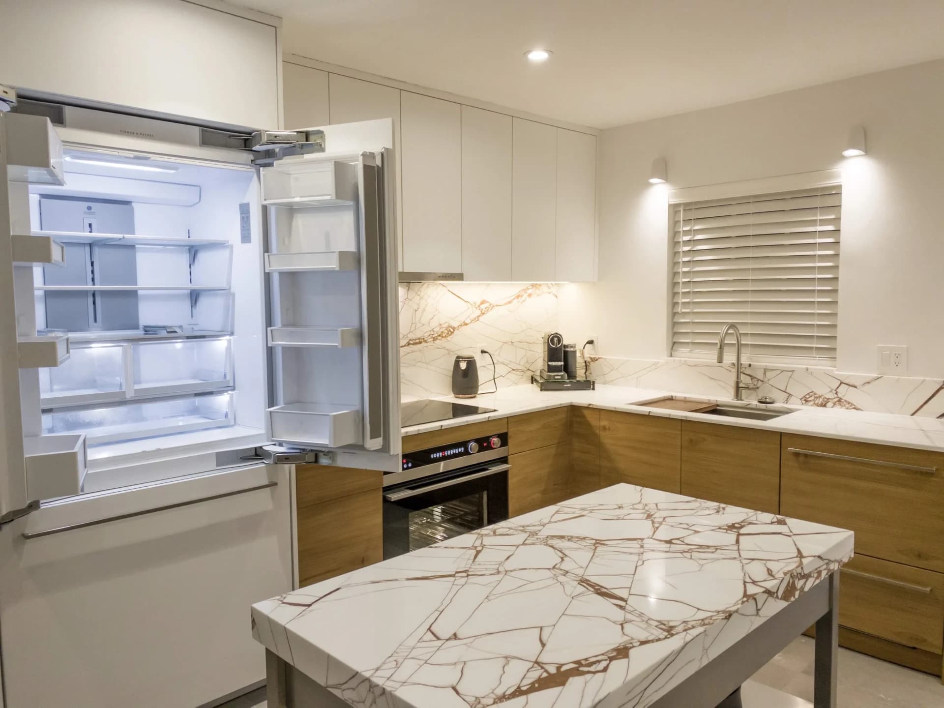 Custom kitchen cabinetry installed in a Miami Beach, FL condo